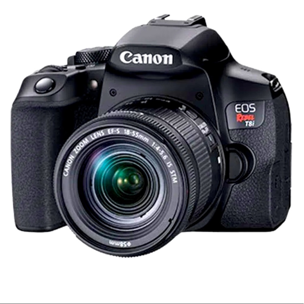 Cannon rebel with 18-55 mm lens, charger and camera strap.